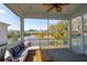 Relaxing screened-in porch with view of the community pond and fountain at 1537 Cultivation Ln, Mount Pleasant, SC 29466