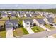 Aerial view of a residential neighborhood with well-maintained homes and green spaces at 163 Cypress Plantation Rd, Moncks Corner, SC 29461
