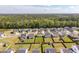 An aerial view reveals the neatly arranged homes and green spaces in this suburban neighborhood at 163 Cypress Plantation Rd, Moncks Corner, SC 29461
