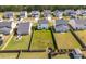 Aerial view of property showcasing spacious fenced yard and neighborhood setting at 163 Cypress Plantation Rd, Moncks Corner, SC 29461