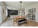 Dining area with modern lighting and access to the living room at 163 Cypress Plantation Rd, Moncks Corner, SC 29461