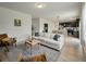 Open-concept living room with hardwood floors and neutral decor at 163 Cypress Plantation Rd, Moncks Corner, SC 29461