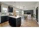 Open floor plan with island kitchen and spacious living area at 163 Cypress Plantation Rd, Moncks Corner, SC 29461