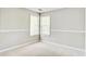 Empty bedroom with chair rail and corner windows allowing plenty of natural light at 1708 Eallystockert Rd, Charleston, SC 29414