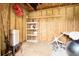 Interior view of the shed, highlighting the ample storage space and wooden construction at 1708 Eallystockert Rd, Charleston, SC 29414