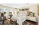Inviting main bedroom with bright windows, neutral colors, and elegant furnishings at 1749 James Basford Pl, Mount Pleasant, SC 29466