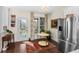 Cozy dining area near the kitchen with a stainless steel refrigerator at 1749 James Basford Pl, Mount Pleasant, SC 29466