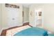 Hallway featuring carpet, a closet, and easy access to the bathroom at 1749 James Basford Pl, Mount Pleasant, SC 29466