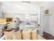 Gourmet kitchen boasts white cabinets, stainless steel appliances and quartz countertops at 1749 James Basford Pl, Mount Pleasant, SC 29466