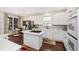 Updated kitchen with a view to the porch featuring white cabinets and stainless steel appliances at 1749 James Basford Pl, Mount Pleasant, SC 29466