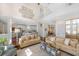 Open concept living space flows into a modern kitchen and dining area at 1749 James Basford Pl, Mount Pleasant, SC 29466
