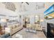 Open-concept living room featuring comfortable seating and an open view to the kitchen area at 1749 James Basford Pl, Mount Pleasant, SC 29466