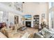 Bright living room features a fireplace, natural light, and comfortable furniture at 1749 James Basford Pl, Mount Pleasant, SC 29466