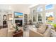 Spacious living room with fireplace, natural light and comfortable seating at 1749 James Basford Pl, Mount Pleasant, SC 29466