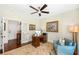 Bright office with a desk, a chair and a view into the hallway at 1749 James Basford Pl, Mount Pleasant, SC 29466