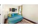 Sitting room featuring a comfortable blue couch and stylish decor, creating a relaxing atmosphere at 1749 James Basford Pl, Mount Pleasant, SC 29466