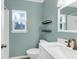 Fresh bathroom with new fixtures, including a modern sink and vanity with decorative shelving at 1785 N Mayflower Dr, Charleston, SC 29412