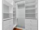 Walk-in closet with custom shelving and drawers, providing ample storage space at 1785 N Mayflower Dr, Charleston, SC 29412