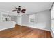 Bright and spacious living room with hardwood floors, crown molding, and plenty of natural light at 1785 N Mayflower Dr, Charleston, SC 29412
