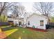Spacious backyard featuring a patio area, lush greenery, and a white exterior at 1906 Cedar Petal Ln, Charleston, SC 29414