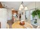 Breakfast nook in an open-concept kitchen area with sliding glass doors and ample natural light at 1906 Cedar Petal Ln, Charleston, SC 29414