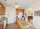 Functional kitchen featuring an island, a view into the living room, and ample storage space at 1906 Cedar Petal Ln, Charleston, SC 29414