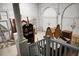 A cluttered basement filled with furniture and household items at 2 Leone Ln, Hanahan, SC 29410