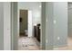 View to bathroom featuring a sleek vanity, toilet, and modern fixtures, all accessed with modern sliding door at 2 Leone Ln, Hanahan, SC 29410