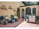 Serene courtyard with cozy seating, a spa, and lush plants, perfect for relaxing at 2 Leone Ln, Hanahan, SC 29410