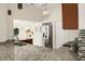 Bright kitchen featuring granite countertops, stainless steel appliances, and modern lighting at 2 Leone Ln, Hanahan, SC 29410