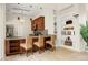 Kitchen with breakfast bar seating, pendant lighting, and stainless steel appliances at 2 Leone Ln, Hanahan, SC 29410