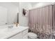 Cozy bathroom featuring a shower with stylish curtain and a sink with ample counter space, offering a clean design at 202 Morning Song St, Summerville, SC 29485
