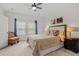 Bedroom featuring a ceiling fan, neutral decor, and a comfortable bed at 202 Morning Song St, Summerville, SC 29485