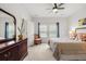 Bedroom with a ceiling fan and dresser at 202 Morning Song St, Summerville, SC 29485
