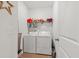 Well-lit laundry room with modern washer and dryer, providing efficient space for laundry tasks at 202 Morning Song St, Summerville, SC 29485
