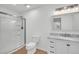 Bright bathroom featuring marble countertops and a glass enclosed shower at 217 Mini Farm Rd, Bonneau, SC 29431