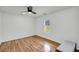 Bright bedroom featuring a ceiling fan, wood floors, and natural light at 217 Mini Farm Rd, Bonneau, SC 29431