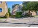 Charming two-story home features a spacious porch and landscaped yard with mature trees at 22 Ashton St, Charleston, SC 29403