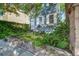 Charming exterior with lush landscaping and a traditional design, offering great curb appeal at 22 Ashton St, Charleston, SC 29403