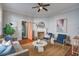Comfortable living room with modern decor, fireplace, and a ceiling fan for added comfort at 22 Ashton St, Charleston, SC 29403