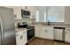 Modern kitchen with stainless steel appliances and granite countertops at 222 New Iris Ln, Ridgeville, SC 29472