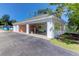 Exterior shot of the community car wash featuring a covered area and garage bay for detailing and cleaning vehicles at 2221 Chatelain Way, Mount Pleasant, SC 29464