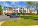 Inviting condo complex with lush landscaping and ample parking for residents and visitors at 2221 Chatelain Way, Mount Pleasant, SC 29464