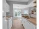 Bright eat-in kitchen with stainless appliances, butcher block counters, and natural light at 2221 Chatelain Way, Mount Pleasant, SC 29464