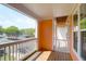 Private outdoor patio with wood flooring, offering a relaxing space to enjoy the neighborhood view at 2221 Chatelain Way, Mount Pleasant, SC 29464