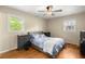 Cozy bedroom featuring hardwood floors, neutral walls, and a ceiling fan at 223 Dandridge Rd, Walterboro, SC 29488