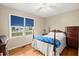 Bedroom featuring hardwood floors, a ceiling fan, and large window for natural light at 223 Dandridge Rd, Walterboro, SC 29488