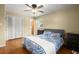 Comfortable bedroom with a large bed, ceiling fan, and natural lighting at 223 Dandridge Rd, Walterboro, SC 29488