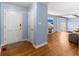 Inviting entryway featuring wood floors and an open transition into the living room at 223 Dandridge Rd, Walterboro, SC 29488