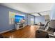 Bright living room featuring hardwood floors, a large window, and comfortable seating at 223 Dandridge Rd, Walterboro, SC 29488